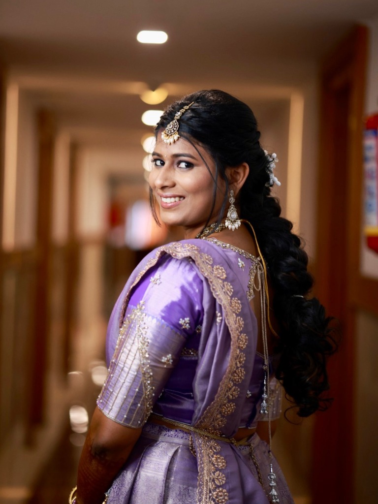 Bridal hairstyling service by Makeovers by Ranjitha — elegant buns and traditional bridal hair
